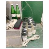 GLASS BOTTLES, ONE WITH HORTICULTURE CHARCOAL,