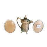 SILVERPLATED CREAMER AND TOW PICTURE FRAMES