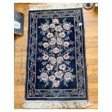 AREA RUG W/ FRINGE BLACK/WHITE ROSES 24" X 13"