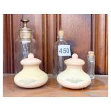 VINTAGE GLASS BOTTLES, ONE WITH BRASS HANDLED