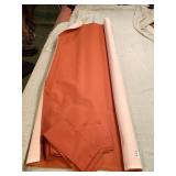 ROLL OF ORANGE POOL TABLE FELT