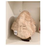 SCULPTED PIECE OF MARBLE WITH HAND CARVED FACES