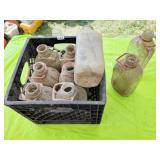 10 GLASS ï¿½ GALLON MILK JUGS IN A PLASTIC CRATE
