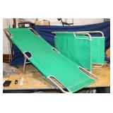 TWO GREEN CAMPING COTS
