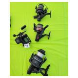 FOUR FISHING REELS, DAIWA WITH LINE COUNTER,