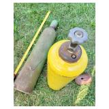 GREEN OXYGEN TANK. YELLOW ACETYLENE TANK.