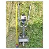 ROTOTILLER- 48 INCHES TALL. WELL-USED. TILLS 9