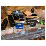 CANNON AE1 WITH LENSE SET BATTERIES AND BOOKLETS