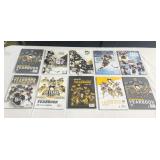 STACK OF 10 2010 UP PENGUINS YEARBOOKS