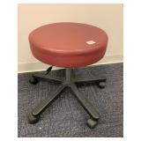 RED STOOL ON WHEELS