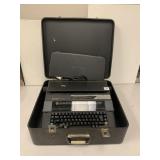 SHARP ELECTRONIC TYPEWRITER IN CASE