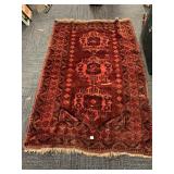 RED AREA RUG 78" X 51"