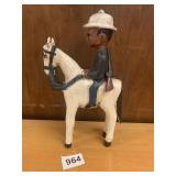 CARVED WOODEN MAN ON HORSE 10" H