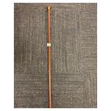 BROWN CANE WITH METAL SURROUND