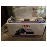 T FAL IRON IN OB AND IRONING BOARD