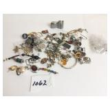 SMALL GROUP OF SINGLE EARRINGS CLEAR PLASTIC