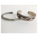 TWO SILVER CUFF BRACELETS