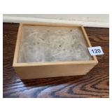 BOX OF DRIED SEEDS IN SHOWCASE