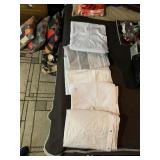 FABRIC SHOWER CURTAINS AND SHOWE CURTAIN LINERS