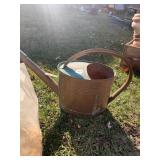 COPPER WATER CAN AND DRAINAGE ROCKS PARTIAL BAG