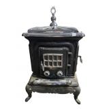 VOGELZANG PARLOR STOVE CAST IRON & CHROME WITH 2
