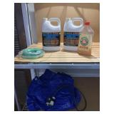 BLUE TARP, EXTENSION CORD, WATER SEALER, WEED