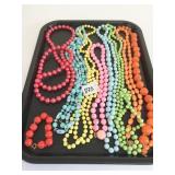 GROUP OF BEADED NECKLACES PLASTIC GREEN ORANGE