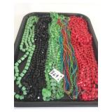 GROUP OF PLASTIC NECKLACES GREEN BLACK RED MULTI