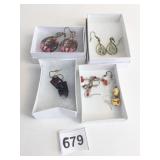 GROUP OF EARRINGS PIERCED PURPLE STONES BOY