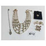 GOLD TONE MULTI STRAND NECKLACE FLOWER PENDANT