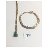 GOLD TONE PENDANT NECKLACE WITH GREEN STONE