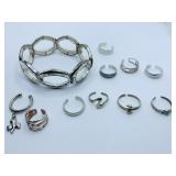 GROUP OF SILVER TONE CUFF RINGS, NOSE RING,
