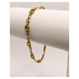 10K GOLD SETTING W/ PERIDOT STONES BRACELET 7"