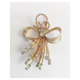 SARAH COVENTRY GOLD TONE BOW PIN WITH RHINESTONES