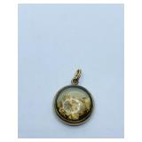 GOLD IN PENDANT 1.59 GRAMS