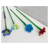 4 GLASS STEM HEAVY FLOWERS ONE HAS A METAL ROD
