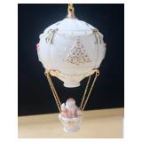 HO HO HO FROM ABOVE SANTA IN A HOT AIR BALLOON