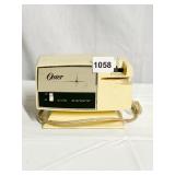 OSTER ELECTRIC KNIFE SHARPENER MODEL #511-01A
