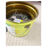 NAILS IN OLD TIN BUCKET