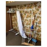TWO ROLLING CLOTHING RACKS WITH HANGERS