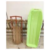TWO SNOW SLEDS