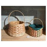 TWO HANDLED WOVEN BASKETS ONE IS LONGABERGER
