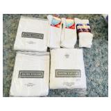 3 PACKS OF T SHIRTS SIZE 5052 AND WHITE SOX
