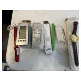 NEW WATCH, LIGHT PEN, THERMOMETER, ETC.