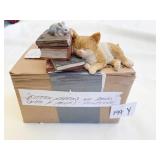 KITTEN NAPPING ON BOOKS FIGURING WITH BOX