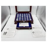 COLORIZED KENNEDY HALVES IN DISPLAY CASE WITH