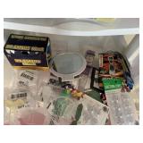 SUCTION CUPS AND OTHER CONTENTS OF DRAWER