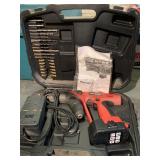 MANSFILED DRILL W/ BATTERY AND CHARGER IN CASE W/