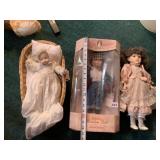 PORCELAIN DOLLS ONE STILL IN BOX