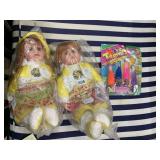 2 BABY DOLLS AND NEW IN PACK TROLLS